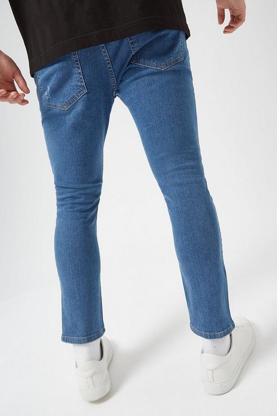 Burton Skinny Crop Mid Blue Rip Jeans 3