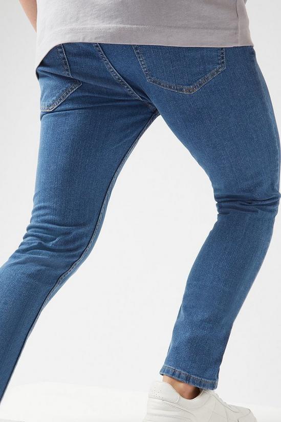 Burton Skinny Flat Blue Jeans 4