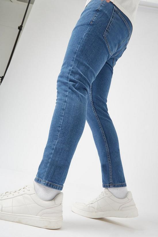 Burton Super Skinny Flat Blue Jeans 4