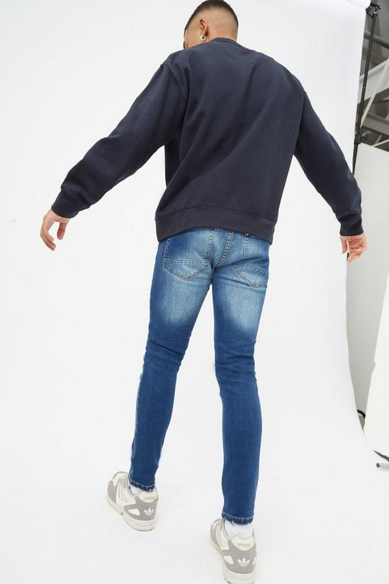 Burton Super Skinny Mid Blue Rip Jeans 3