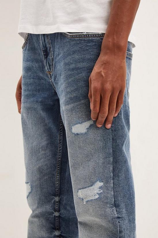 Burton Slim Stitch Repair Rip Jeans 4