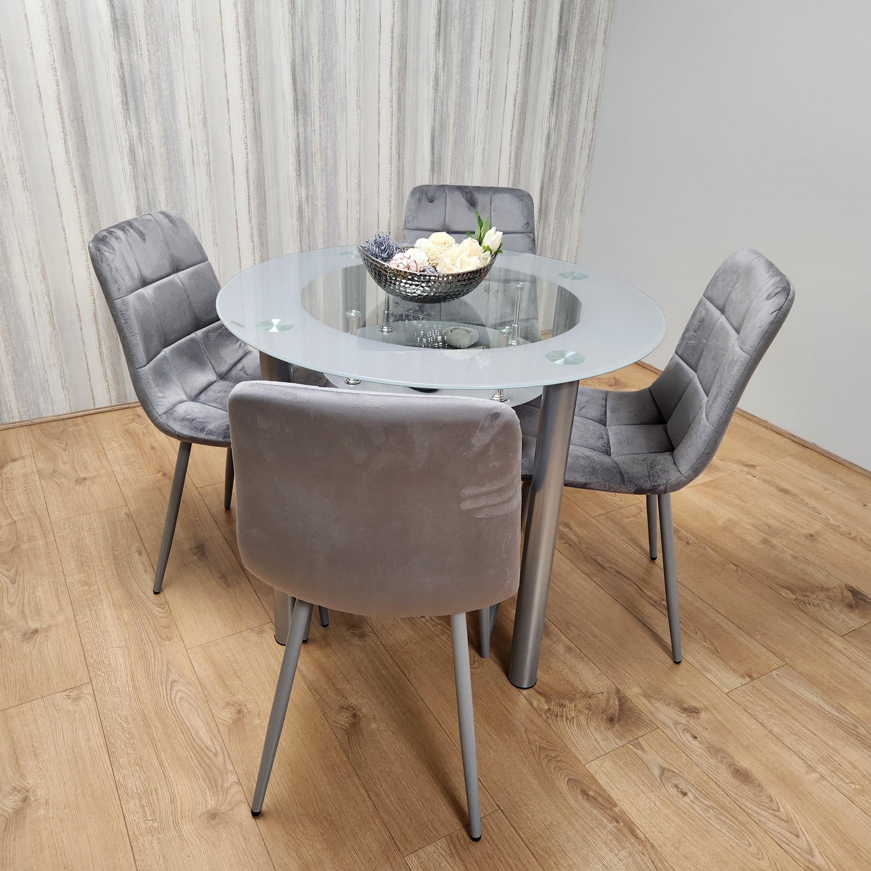 Round glass dining table store and grey chairs